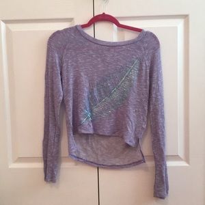 Purple long sleeve shirt with sequin feather.